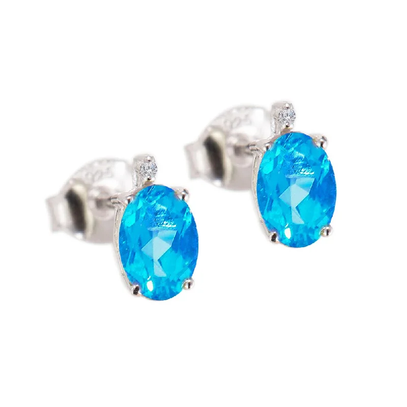 Sterling Silver 1.15 ct Oval Blue Topaz and White Diamond Earring